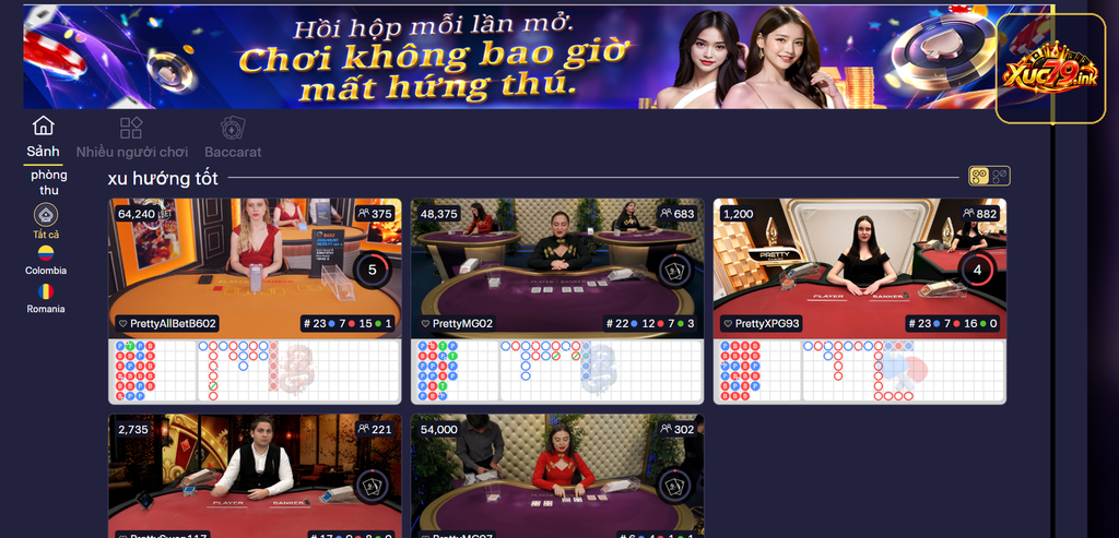 Ảnh sảnh Live casino Xuc79 hiển thị nhiều bàn dealer trực tiếp và bảng kết quả baccarat. Ảnh sảnh Live casino Xuc79 hiển thị nhiều bàn dealer trực tiếp và bảng kết quả baccarat.